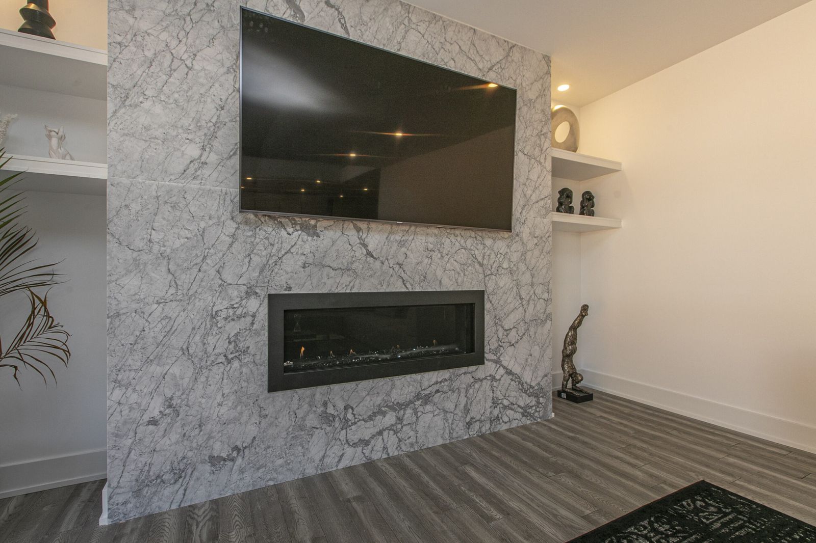 Basement renovation with fireplace